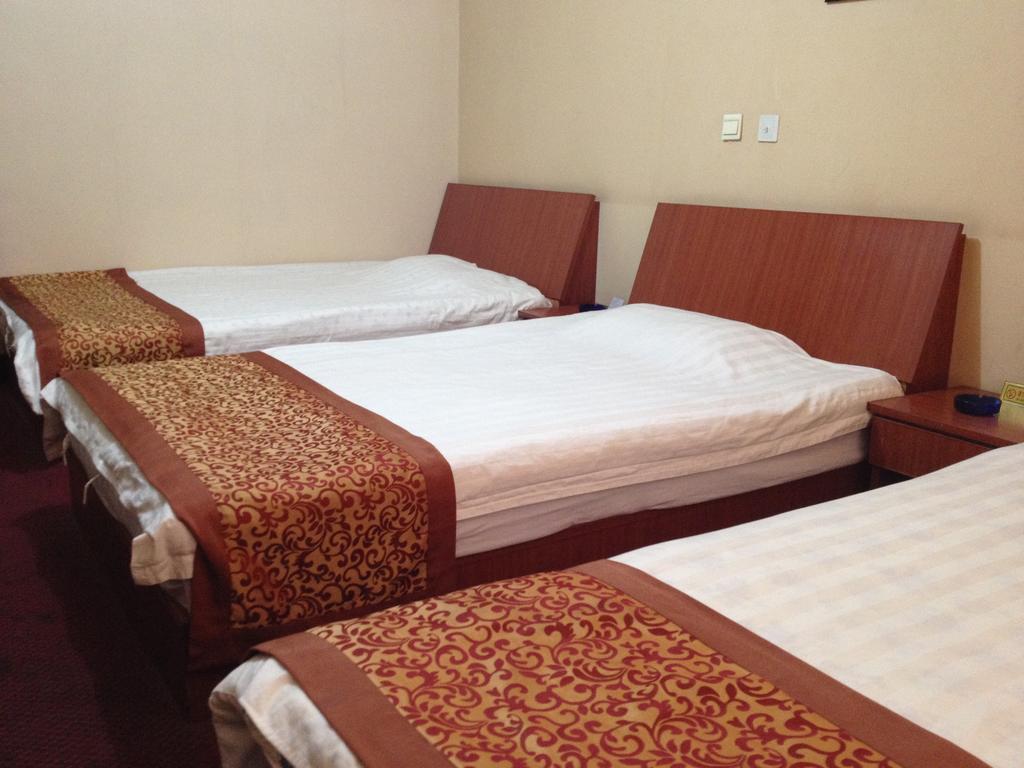 Huike Hotel Τζινάν Δωμάτιο φωτογραφία