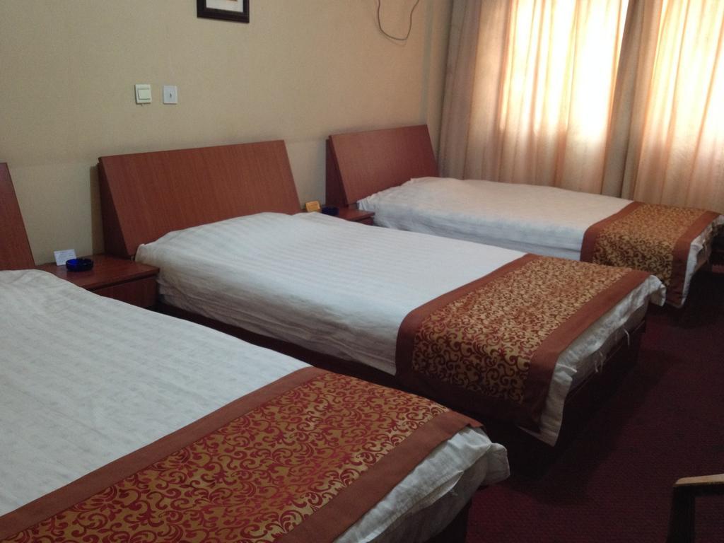 Huike Hotel Τζινάν Δωμάτιο φωτογραφία