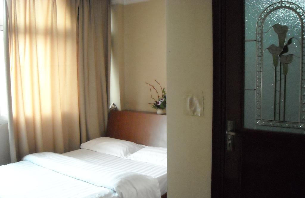 Huike Hotel Τζινάν Δωμάτιο φωτογραφία
